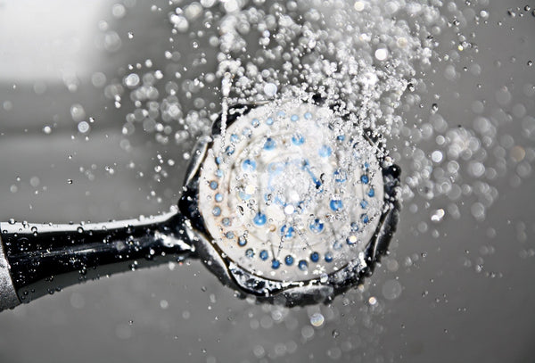 Vacation Rental Housekeeping: How to Clean Shower Heads 